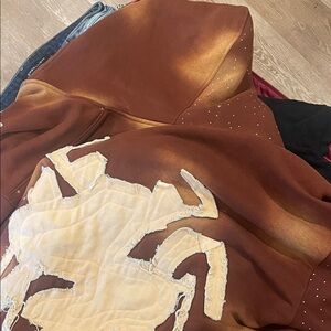Brown Hoodie with Abstract Design